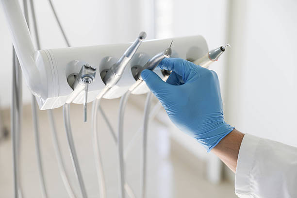 Professional Tooth Extraction technician working in Stem, NC